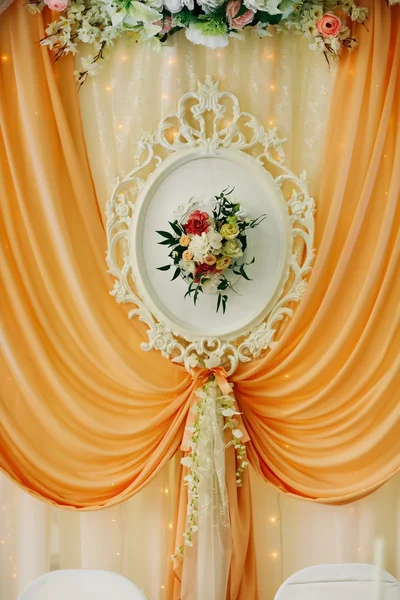 Beautiful wedding table decoration decor of the newlyweds in pea