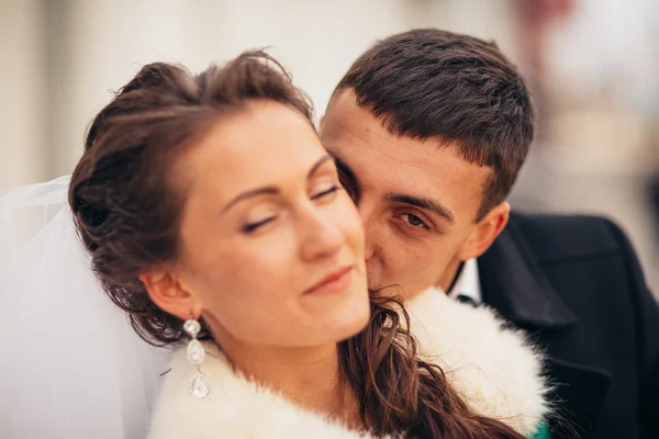 Morning wedding kiss in Prague