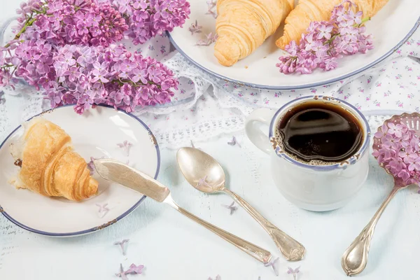 Spring breakfast of coffee and croissants