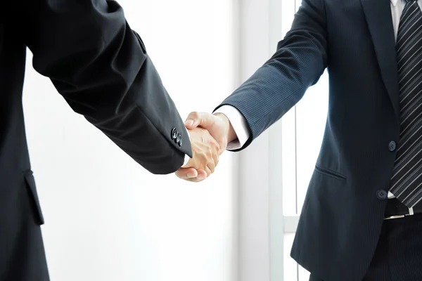 Handshake of businessmen