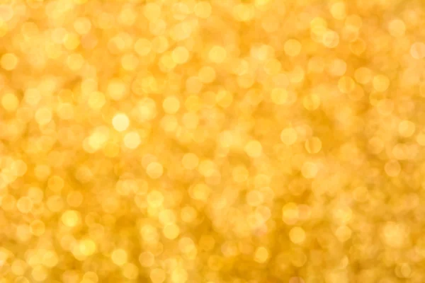 Sparkle glittering gold bokeh abstract background