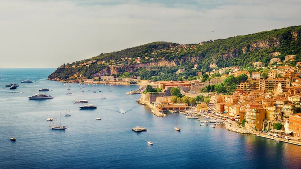 View of luxury resort and bay on sunny day. Villefranche-sur-Mer, french reviera, near Nice and Monaco