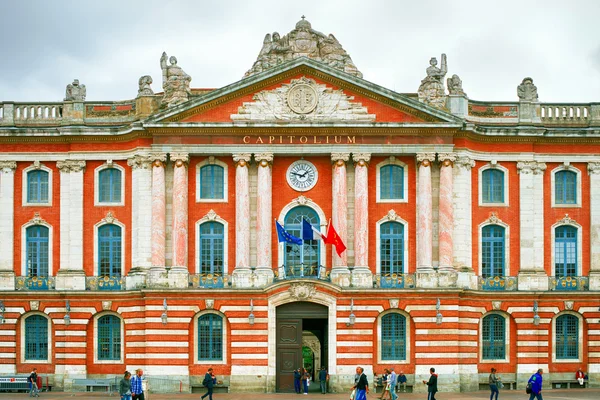 Capitole 135 meters long facade built in 1750 of the characteristic pink brick in Neoclassical style in Toulouse, Haute-Garonne, Midi Pyrenees, southern France.