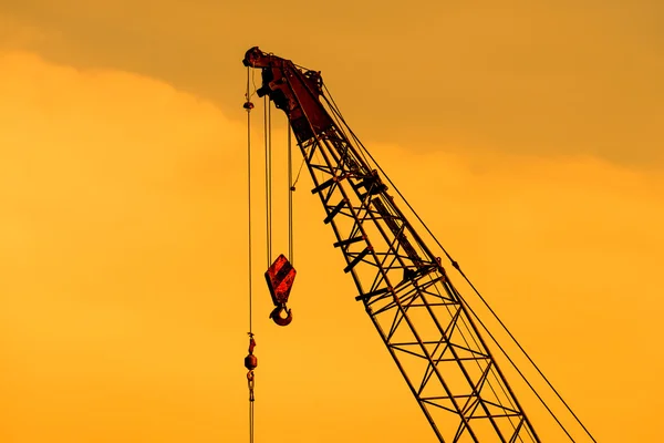 Close up of crane at construction site.