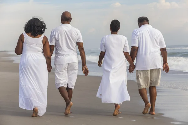 Happy Senior African American Couples Men Women on Beach