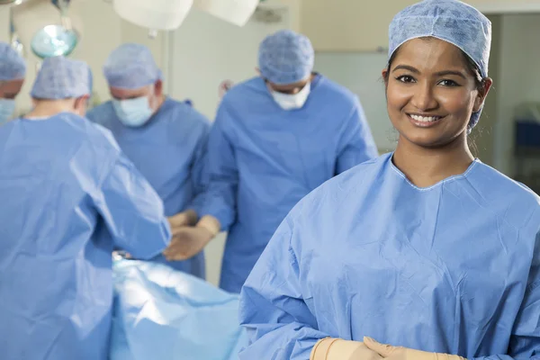 Asian Female Doctor Nurse Operating Theater and Surgical Team