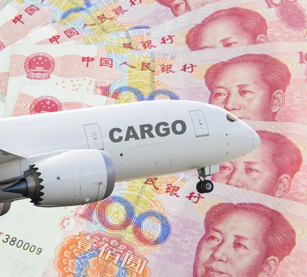 Cargo airplane with chinese yuan background