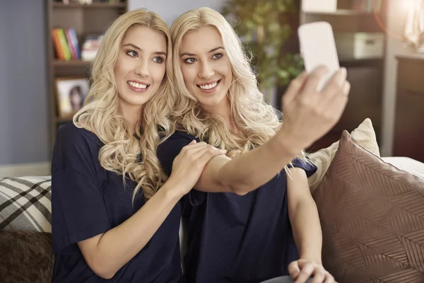 Selfie of beautiful blonde twins