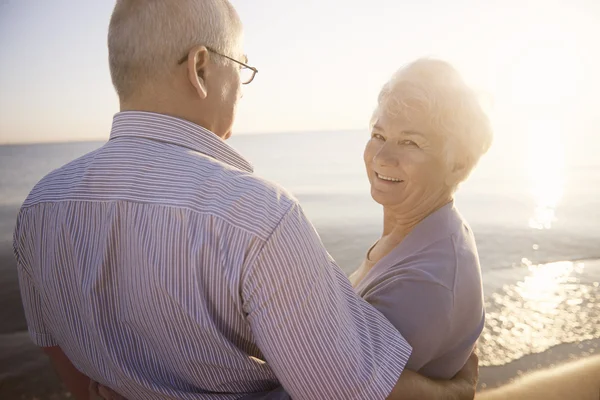 Senior couple spending time by the sea