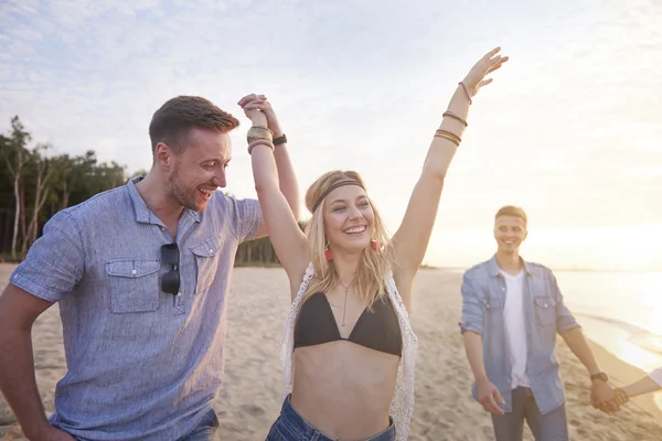 Friends in fantastic party on the beach