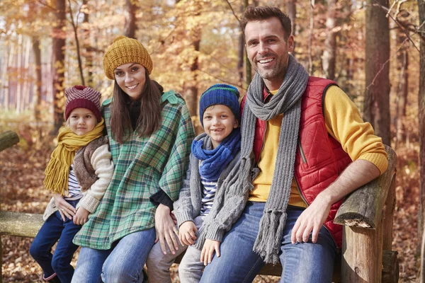 Happy family in the forest