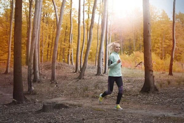 Woman jogging in the forest