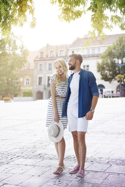 Couple during summer walk at the city