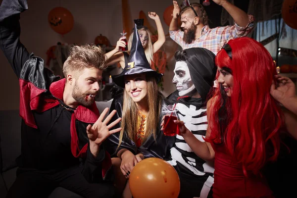 Friends having fun at Halloween party