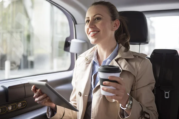 Woman working while a drive