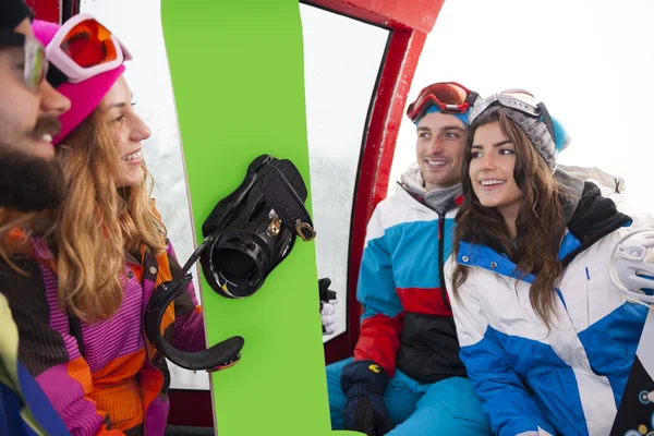 Group of friends on the mountain in winter season