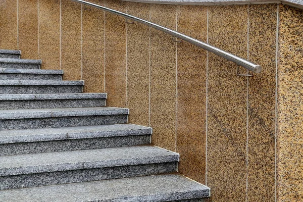 Marble stairs with steel railing