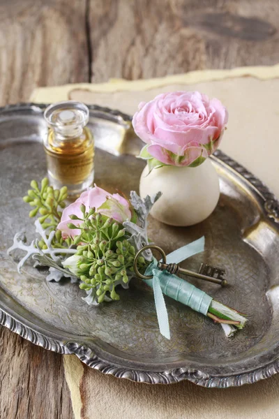 Wedding boutonniere with pink rose