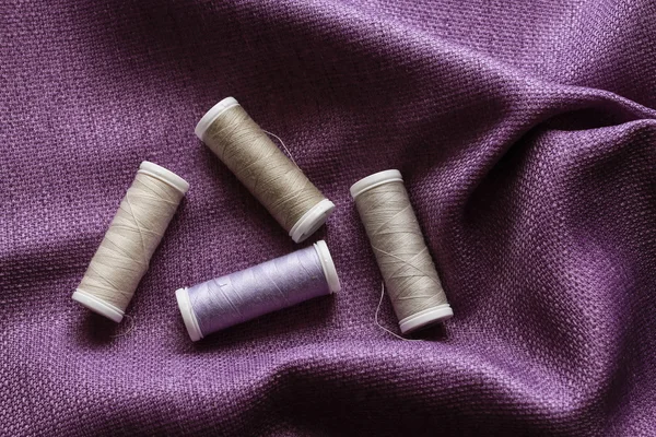Purple fabric and threads