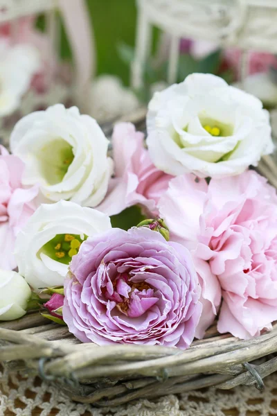 Garden party decorations. Basket of flowers.