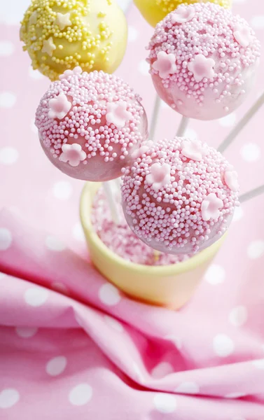 Pink and yellow cake pops