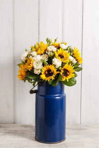 Bouquet of white roses and sunflowers