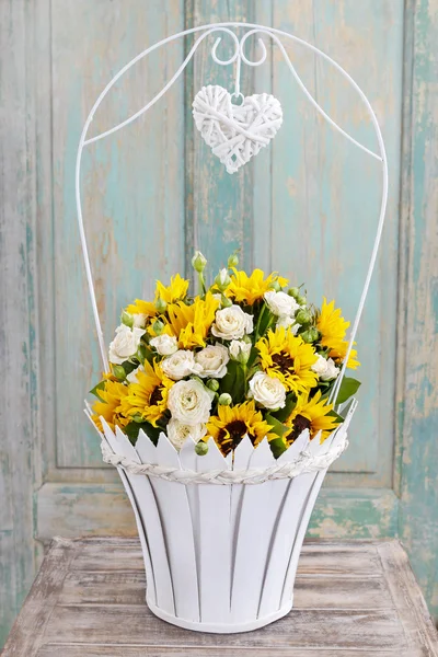 Bouquet of white roses and sunflowers