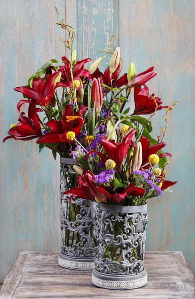 Floral arrangement with red lilies