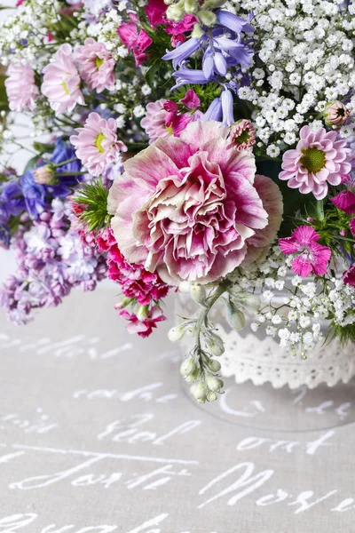 Bouquet of carnations, lilacs and chrysanthemums