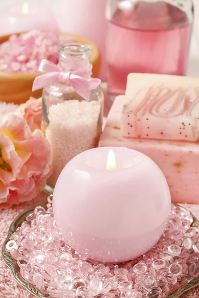 Pink spa set: scented candle, bath caviar, bar of soap and liqui