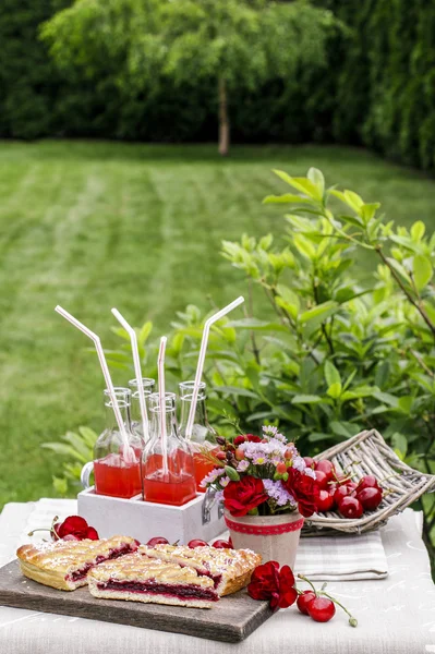 Cherry pie and cherry juice. Garden party