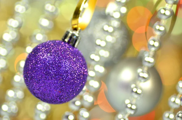 Carnival decoration, colored balls on bokeh background