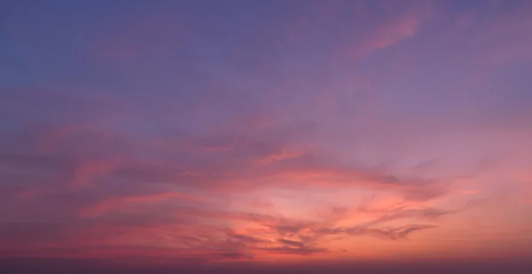 Abstract nature background.Moody pink, purple clouds sun set sky