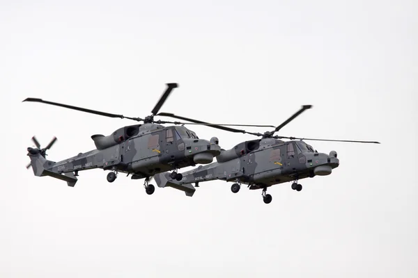 Two Royal Navy | AgustaWestland AW159 Wildcat helicopter in camouflage colours