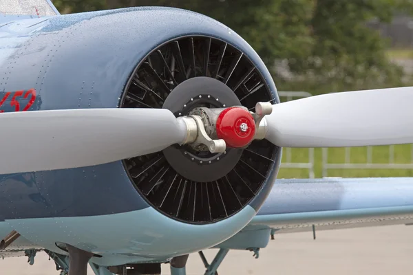 Closeup of a Engine and propeller of old vintage airplane.