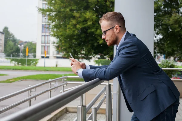 Businessman using mobile phone