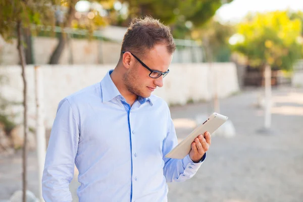 Young tourist  with mobile tablet pc