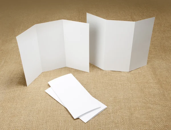 Blank white folding paper flyer