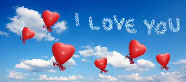 Blue sky with balloon hearts and love you message