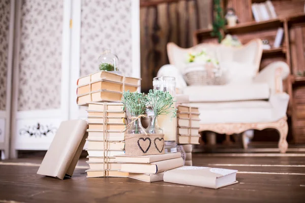 Old books heap on wood floor in interior decoration