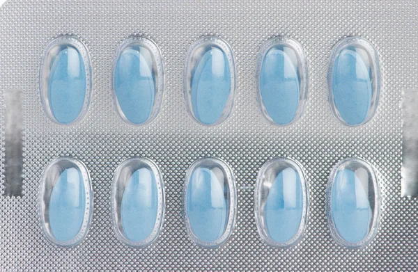 Blue tablet in medicine blister pack