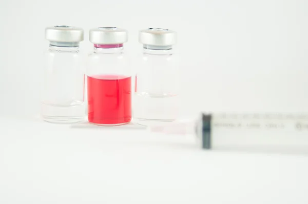 Injection vials and disposable syringe
