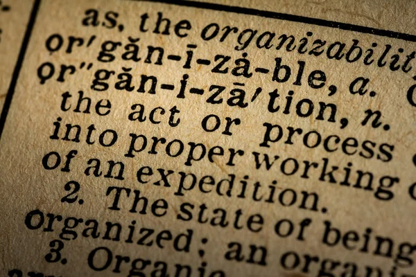 Close-up of the word ORGANIZATION and its definition