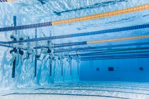 Unrecognizable Professional Swimmers Training