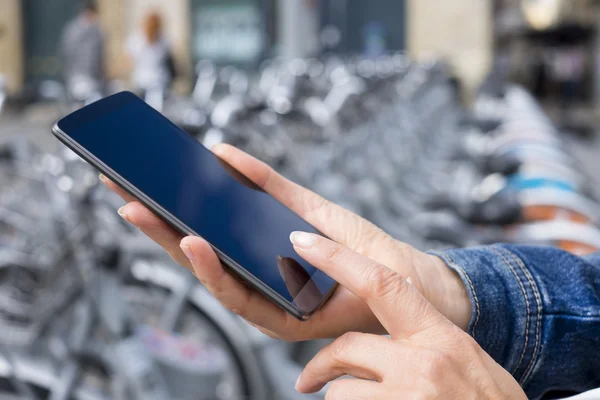 Woman using application on mobile phone.