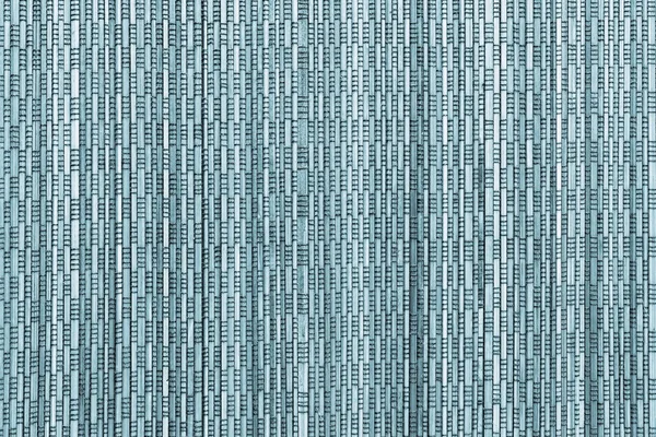 The vertical textured abstract pattern a cover of turquoise color
