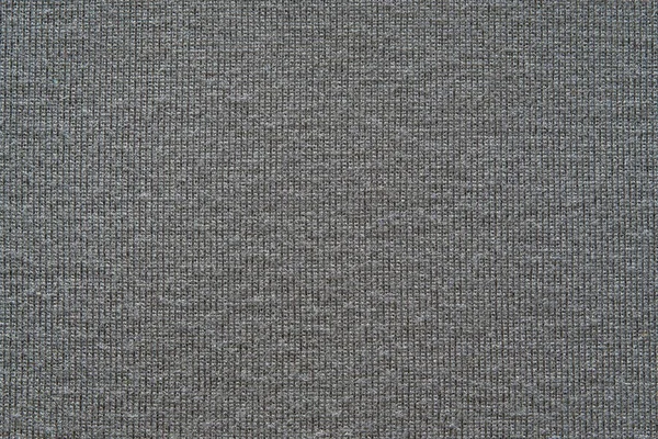 Texture from a soft knitted fabric of gray color