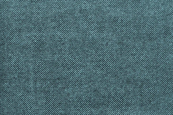 Texture of checkered fabric with turquoise specks