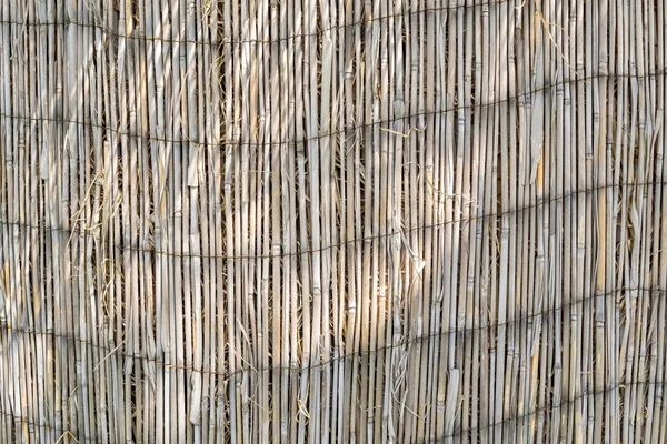 Texture of an old reed curtain