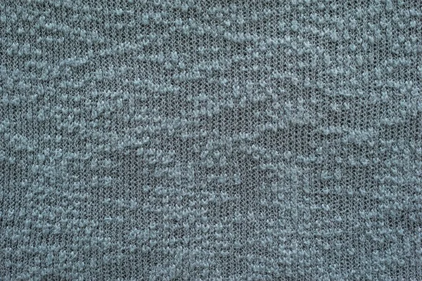 Abstract knitted texture of dark color